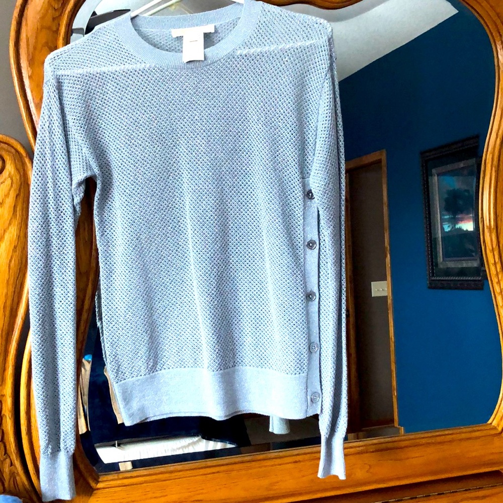 Silver see through sweater. New without tag.